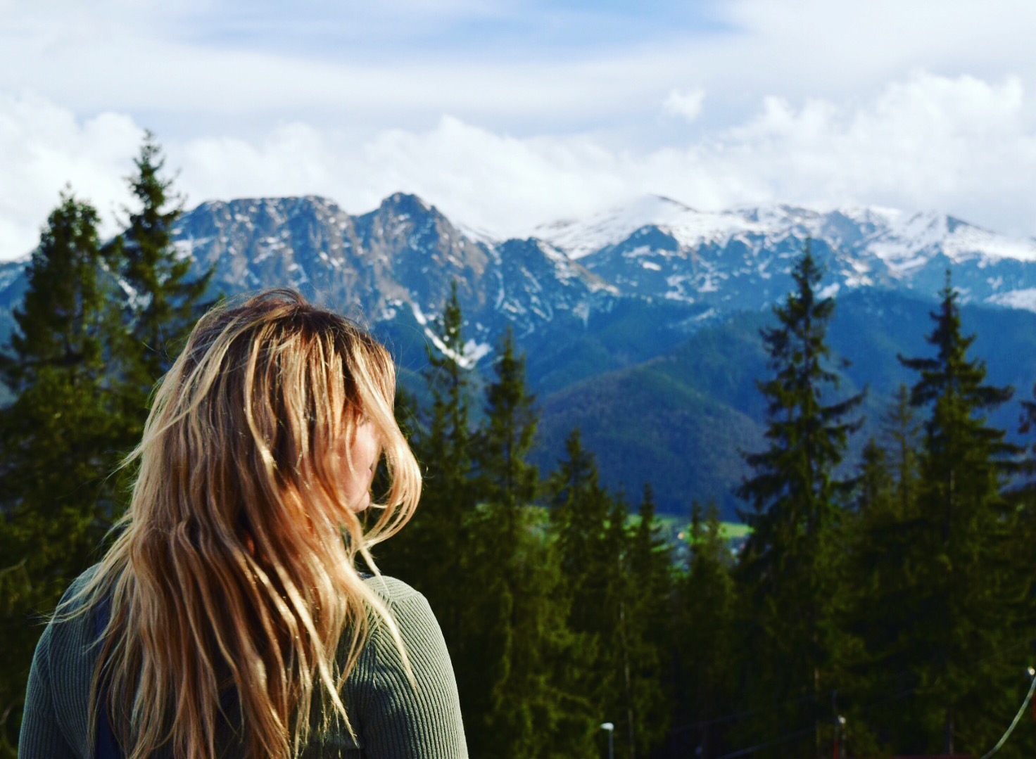 woman looking at mountains